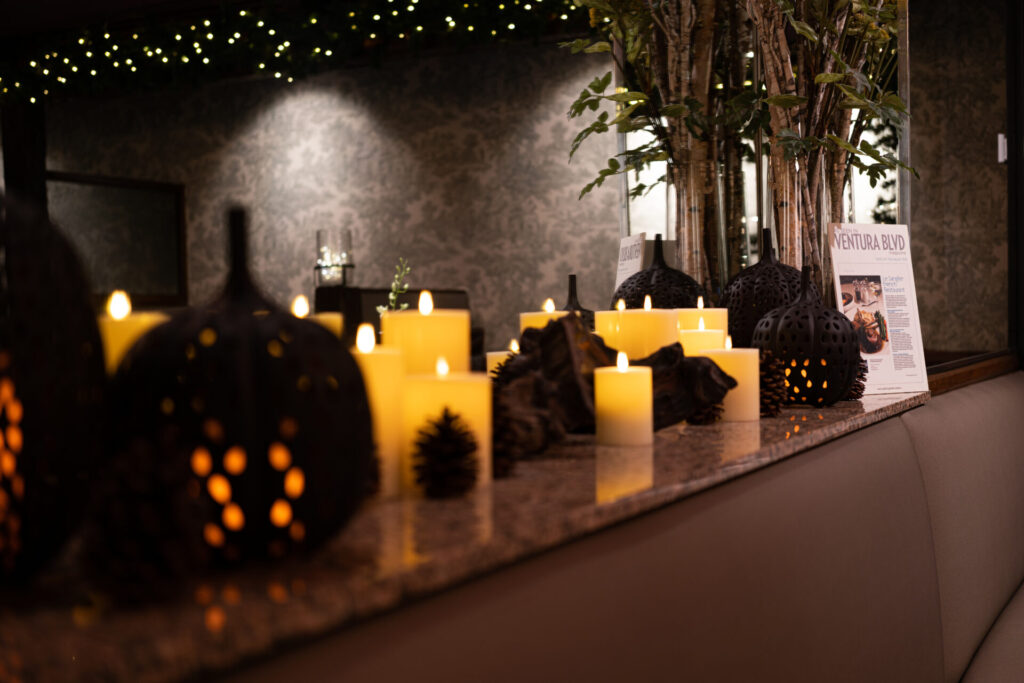 Candles lining the entry at Le Sanglier